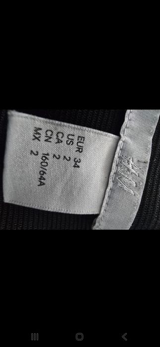 Spodnie damskie wykonane karteczkę