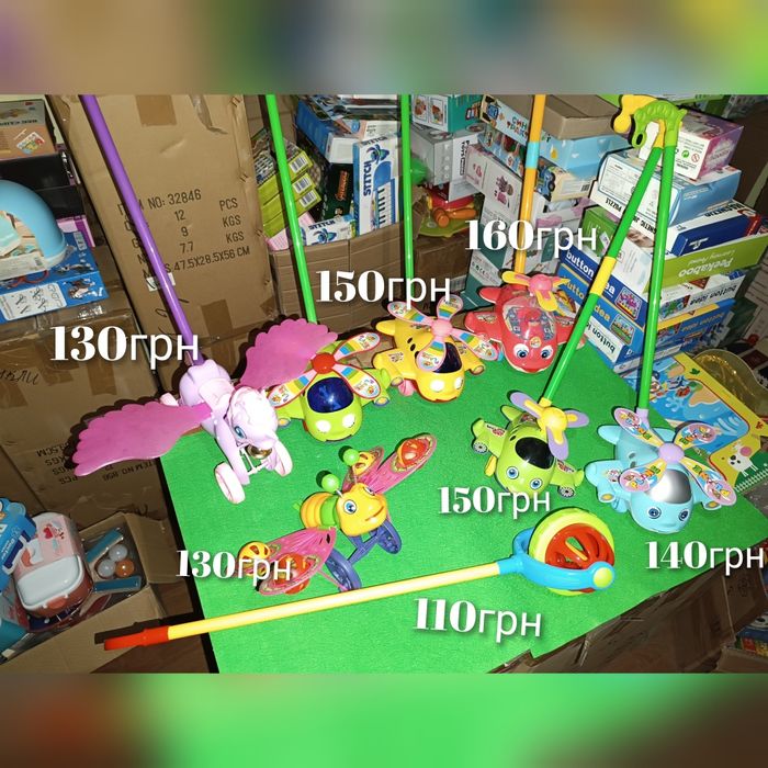 Каталка на палочці вертоліт машинка куля дзвоник брязкальце