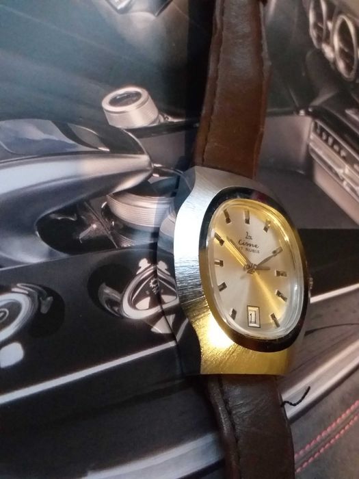 relogio cisne corda manual