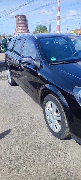 Opel Astra H універсал 1.8