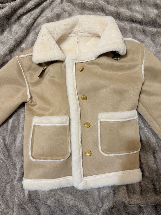 Тепла кожана куртка