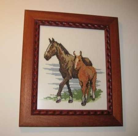 Quadro feito em ponto cruz (trabalho manual)