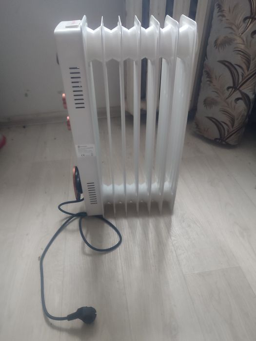 Масляний обігрівач