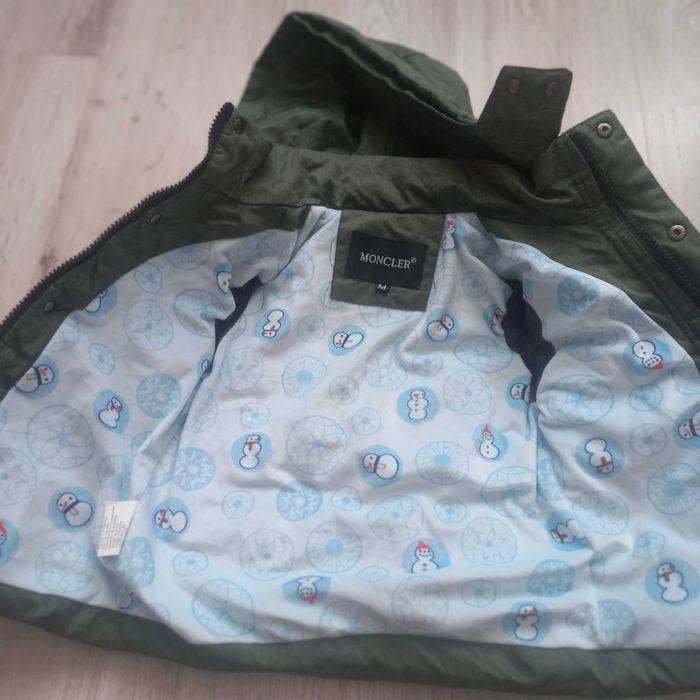 Куртка для хлопчика зеленого кольору.