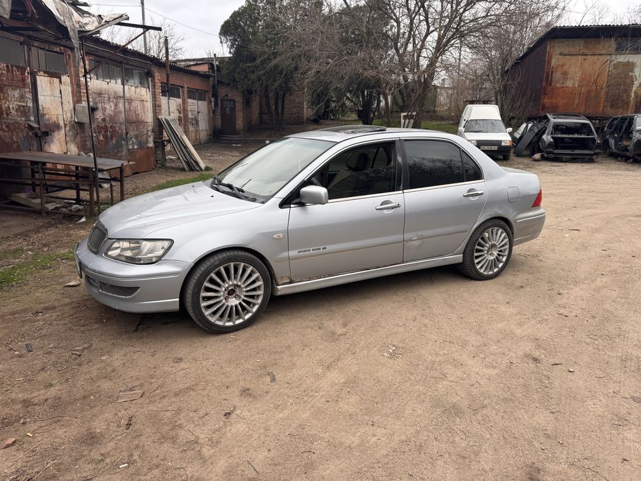 Лансер 9 вираж 1.8