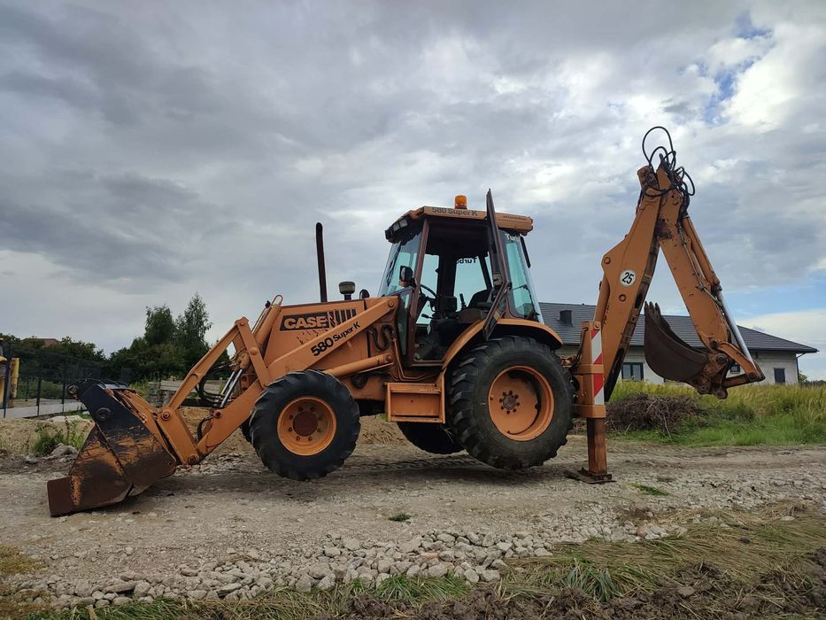 Case 580 Super K  CASE 580 Super K 4x4 Turbo Extendahoe – 4w1 – widły – joysticki