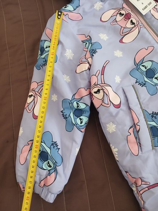 Новий зимовий комбінезон для дівчинки