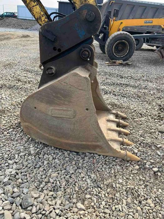 Екскаватор new holland