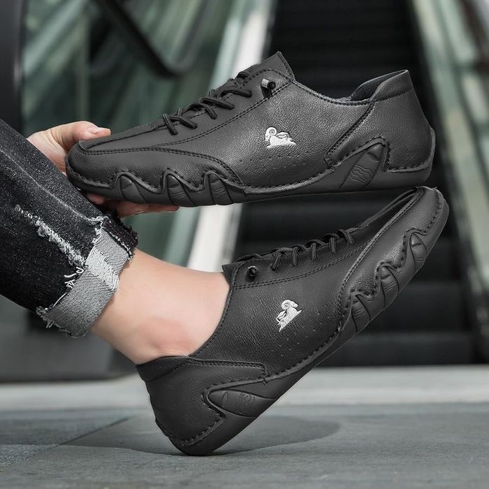 Низькі  м’які шкіряні кросівки. чол. бренд.