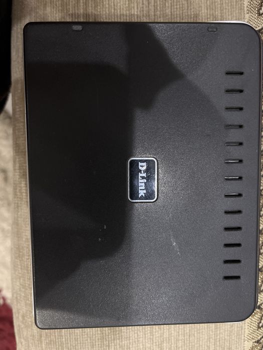 Роутер D-link робочій,вживаний.З блоком живлення.