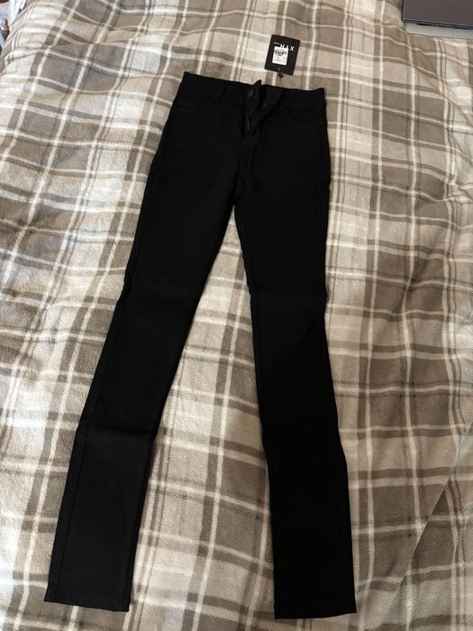 Нові жіночі чорні теплі штани на флісі