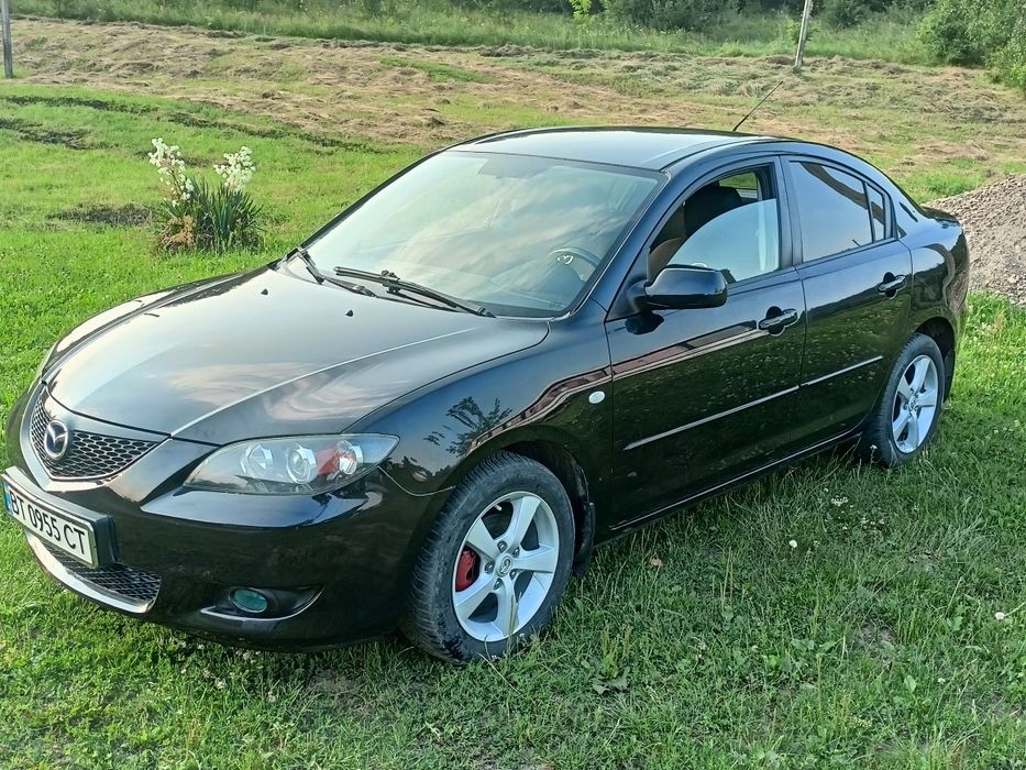 Мазда 3.2006 року