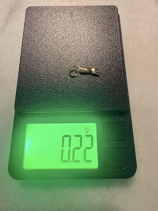 Figa em ouro 19k, para fio - Nova 0,22 gr