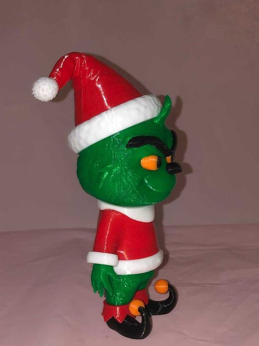 Фігурка Ґрінча в костюмі Санти – ідеальна прикраса до Різдва!
