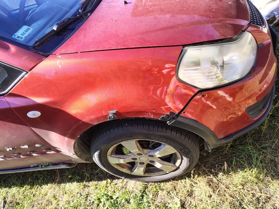 Błotnik prawy przód przedni Suzuki SX4 sx-4 fiat sedici 06-14