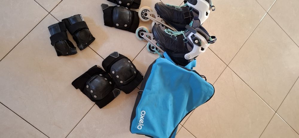 Роліки ,захисна амуніція ,рюкзак