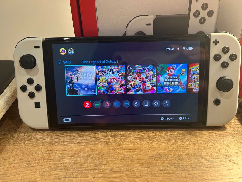 Nintendo Switch Oled + 4 jogos + caixa + bolsa – Excelente estado