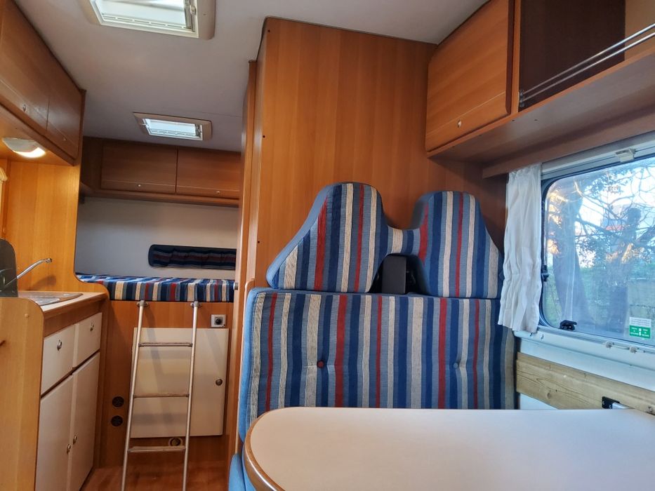 Autocaravana cama transversal