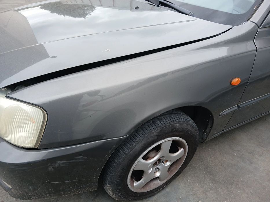 Guarda-lamas esquerdo HYUNDAI Accent II (LC)