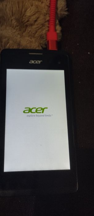 Телефон Acer m220