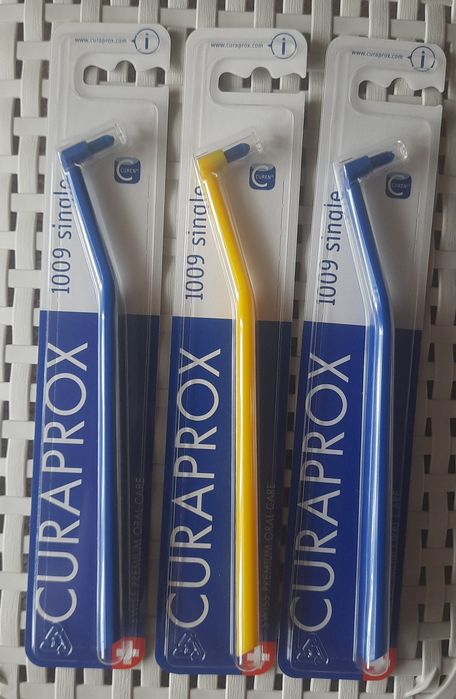 Монопучкова зубна щітка Curaprox 1006 та 1009