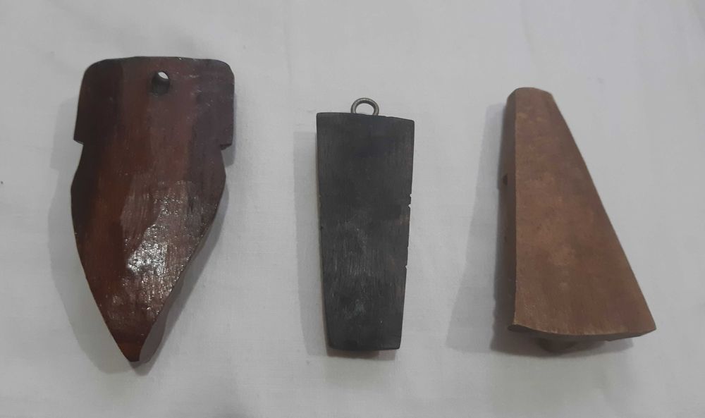 Pequenas Esculturas de Rostos Africanos