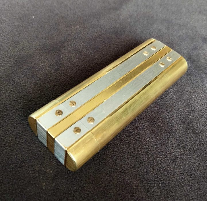 Isqueiros dos anos 70 Cartier Le Must e Cartier Santos
