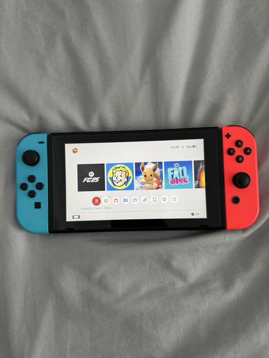 Nintendo Switch V2 128GB + Pokémon + FC 25 + Acessórios + Mala