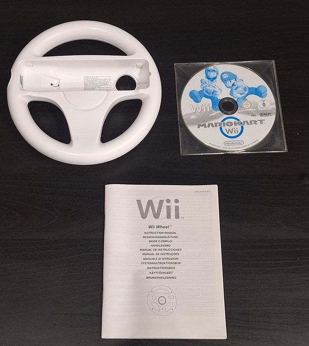 Vendo consola Nintendo Wii com vários jogos.