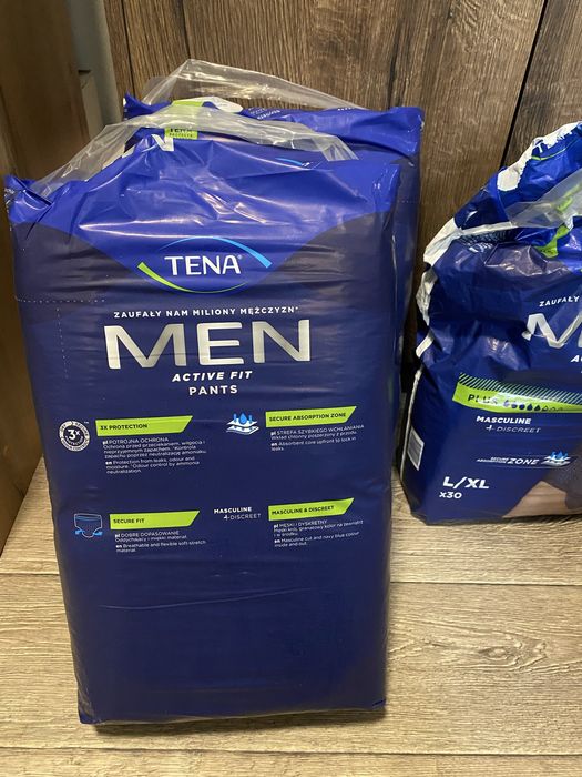 Pieluchomajtki TENA Men Pants nowe, dwie nieotwarte i pół paczki