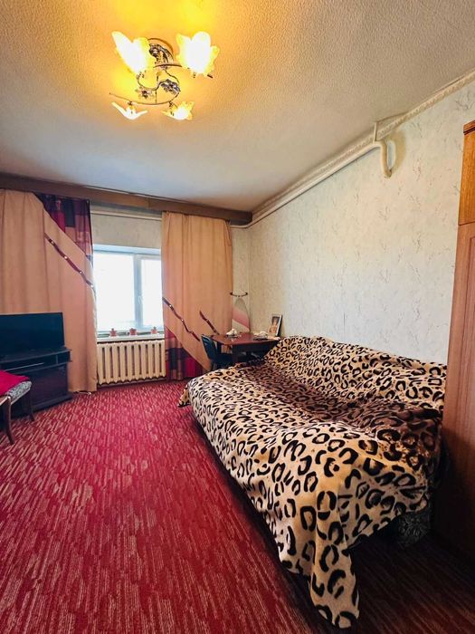 Продам частину будинку в районі Центру.