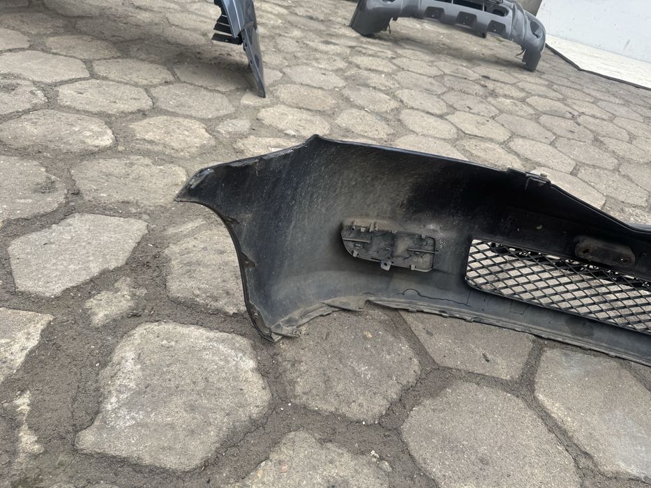Бампер передній мазда 2  MAZDA 2 02- 3M71-17K819-E