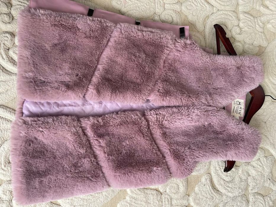 Безрукавка для дівчинки