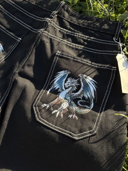 Джинси з принтом на кармані