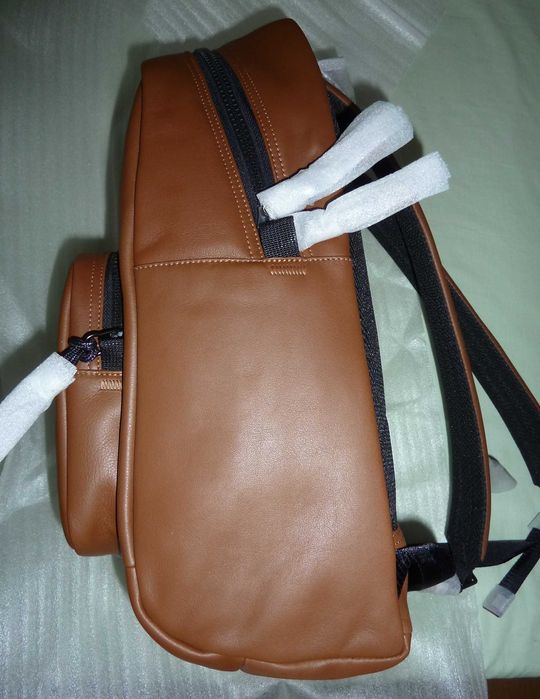 Mochila nova unissexo em pele Coach