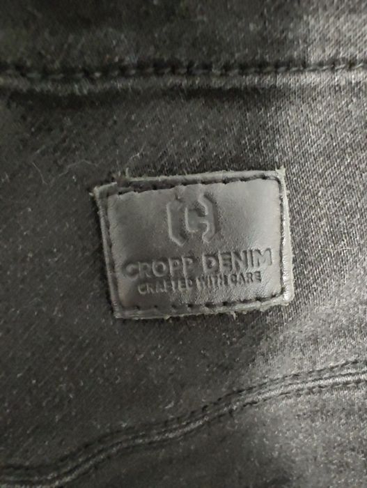 Cropp jeansy joggersy carrot z kieszeniami cargo W30 L32