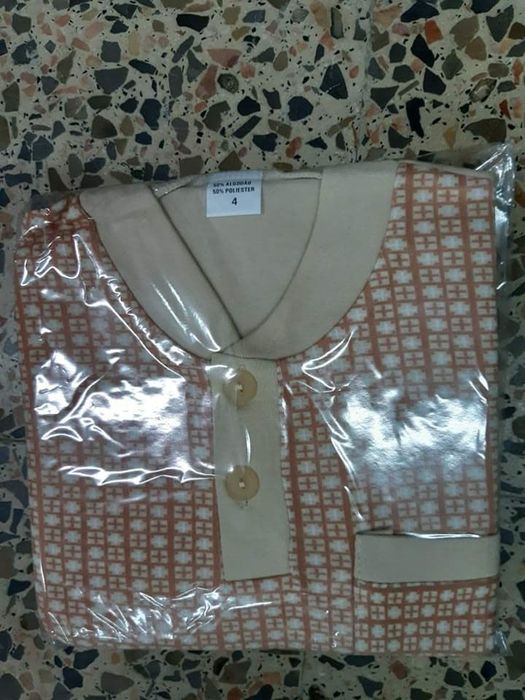 Pijama de criança à homenzinho