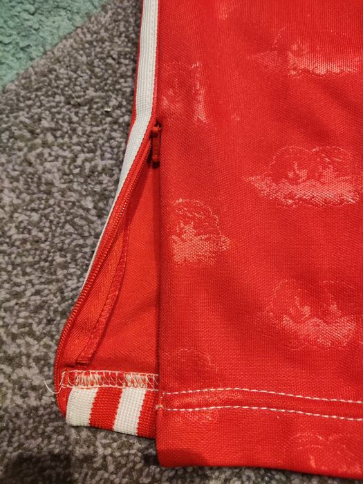 Spodnie adidas fiorucci czerwone.