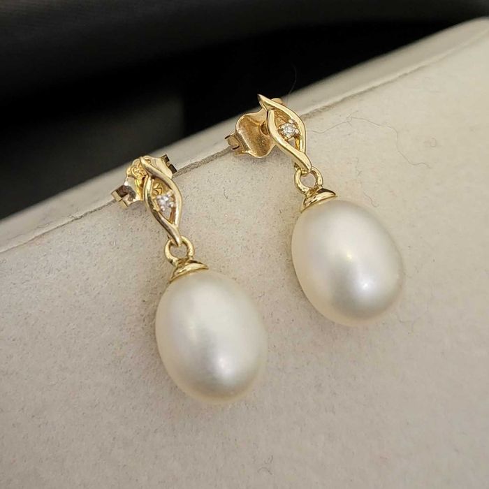 złote kolczyki z perłami i diamentami próby złota 585