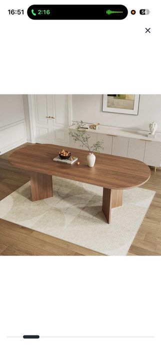 Mesa de jantar extensível e robusta com cantos arredondados e tampo espesso