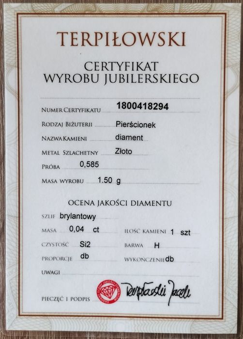 Złoty pierścionek z brylantem + certyfikat autentycznosci