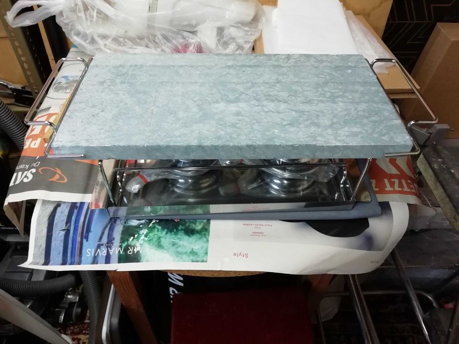 Grelhador de Pedra com lamparinas