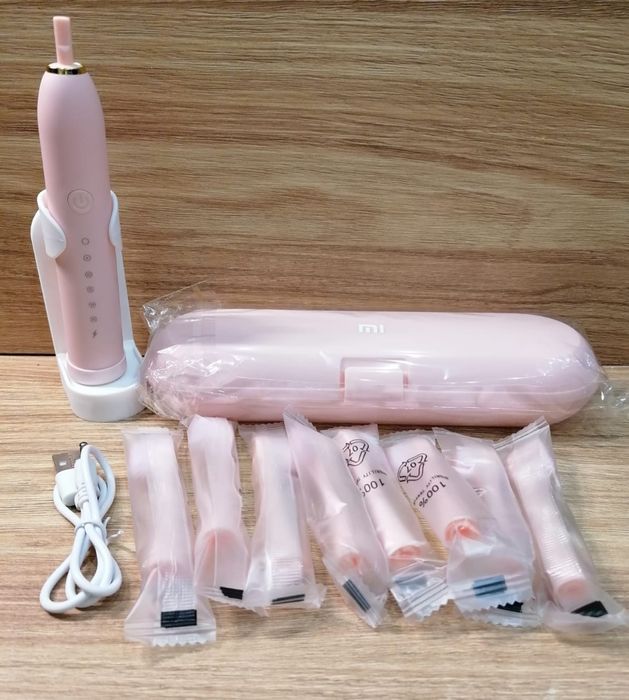 2 zestawy szczoteczek sonicznych czarny i różowy