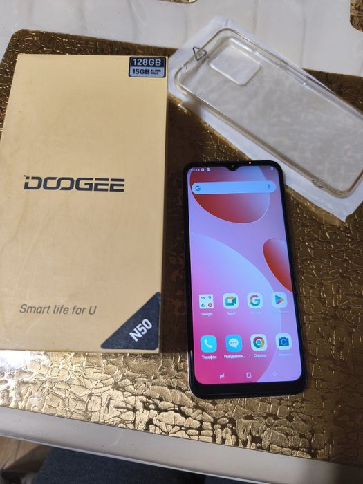 DOOGEE 50 телефон