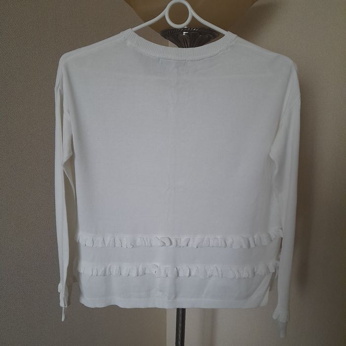 Білі джемпери, кофти .