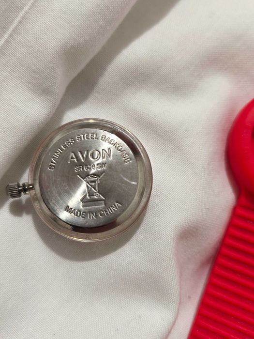 Relógio avon
Pulseira borracha vermelha