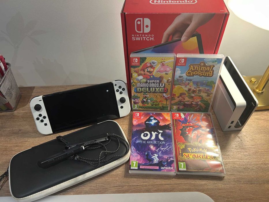 Nintendo Switch Oled + 4 jogos + caixa + bolsa – Excelente estado