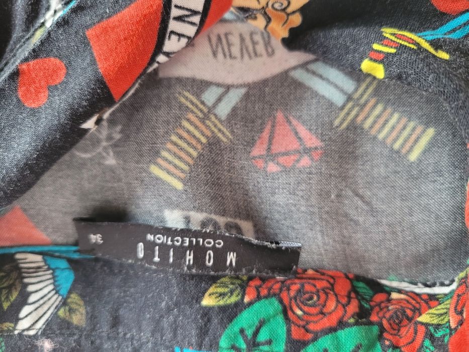Koszula we wzory  tattoo serca, róże..
Mohito roz 34
Dobra od xs do m