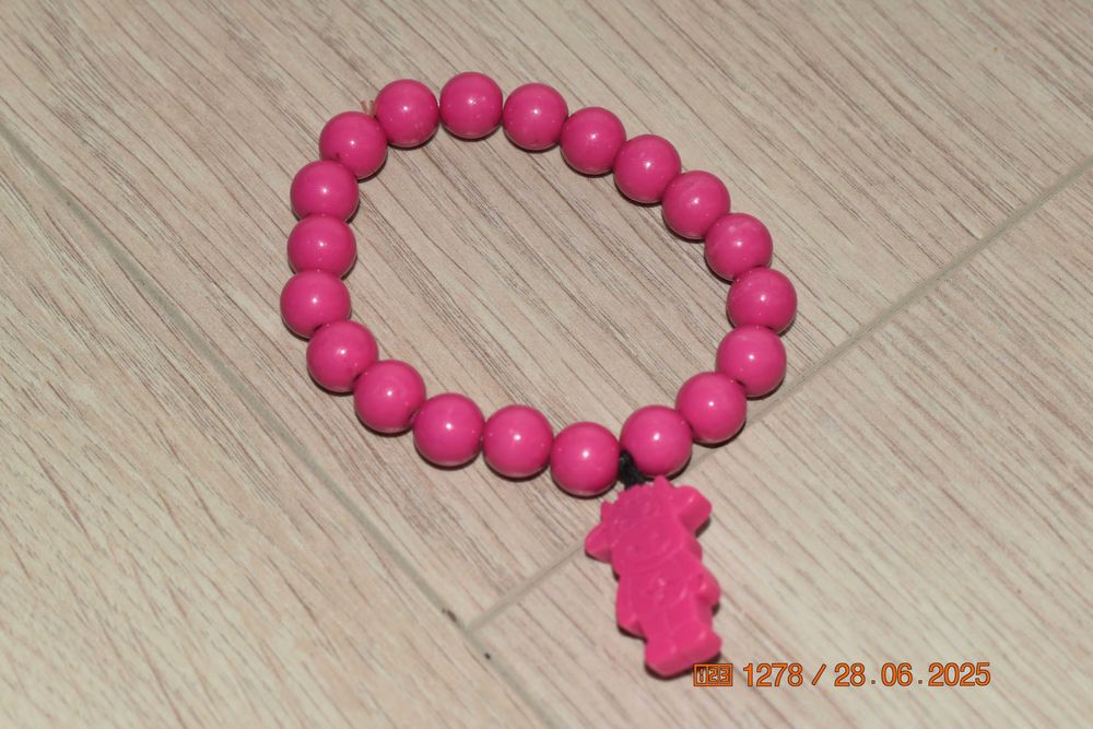 różowa bransoletka z krówką