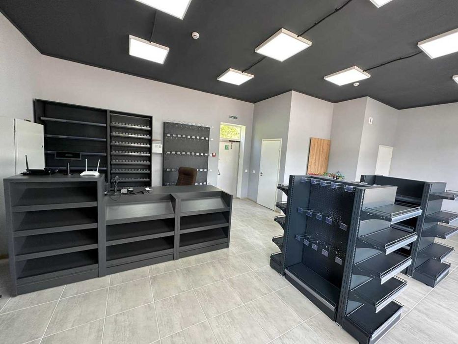 Торгове обладнання для магазину. Стелажі, холодильники, касові бокси